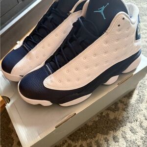 Jordan White and Navy High-Top Sneaker with Teal Jumpman Insole